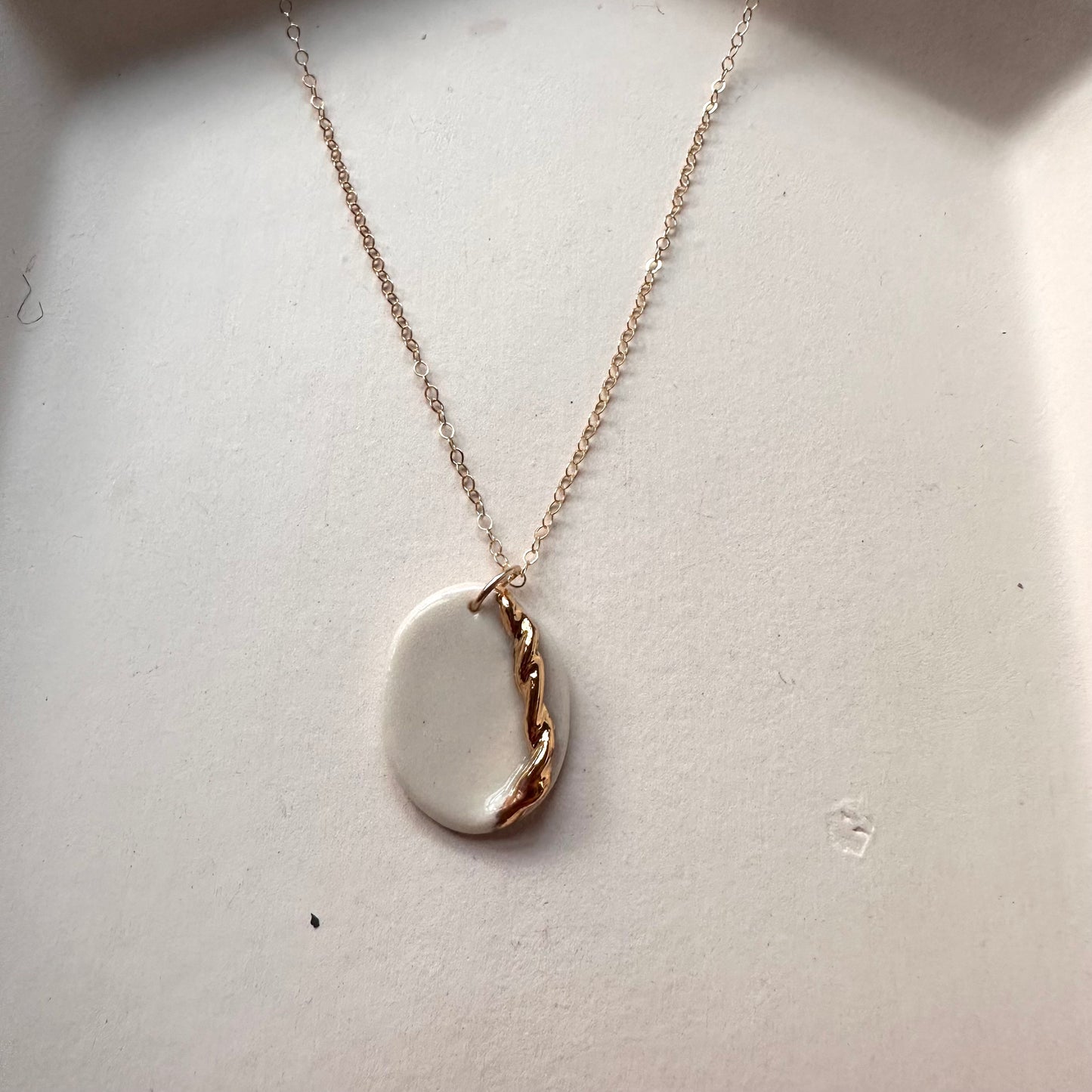 Golden braid necklace