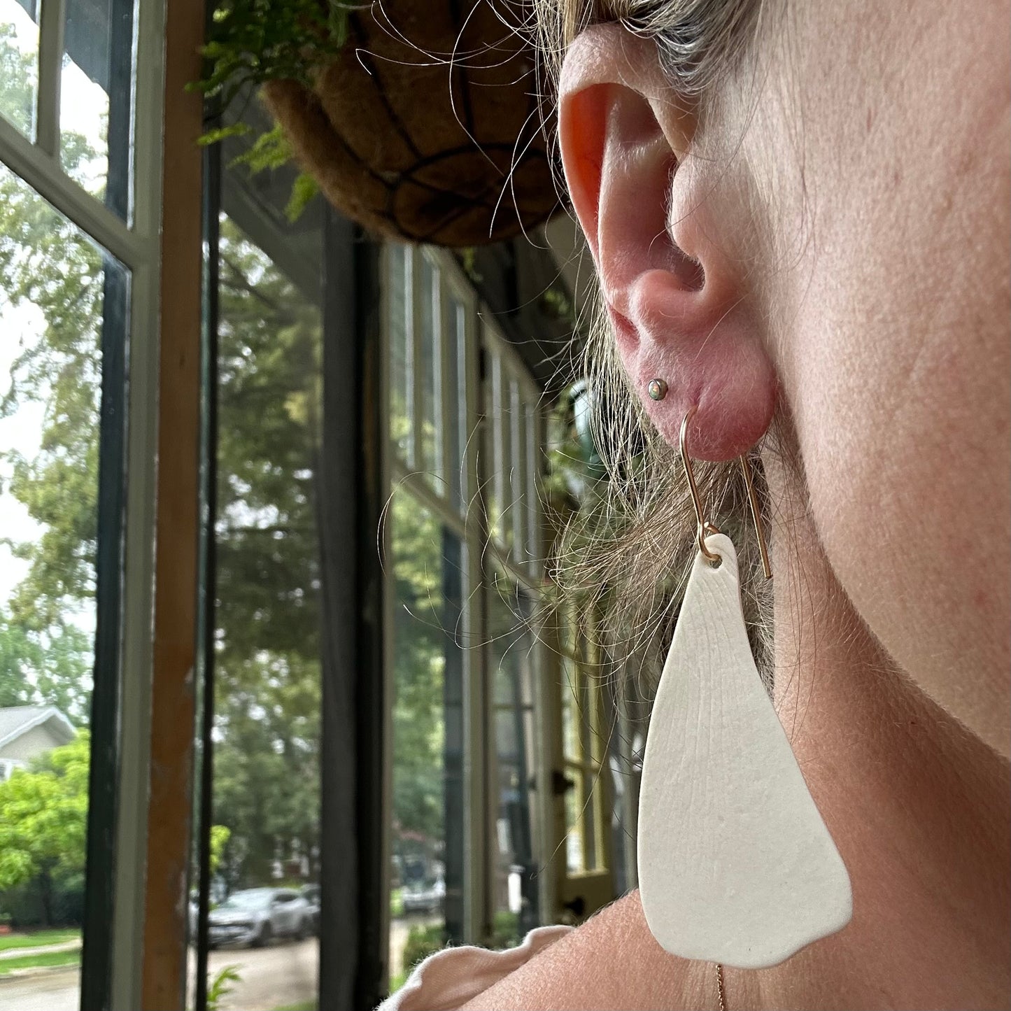 Tall petal dangle earring