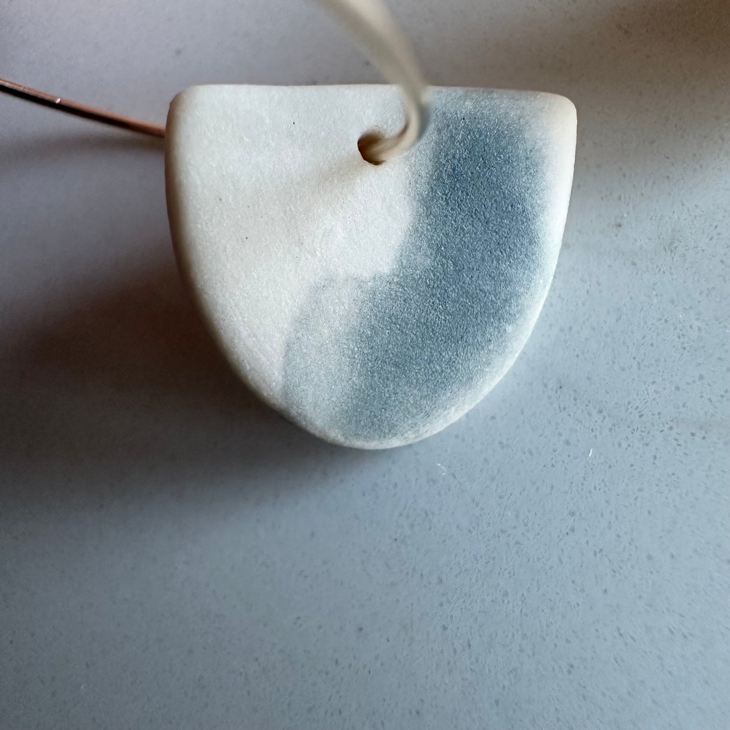 Half-moon hoop earring