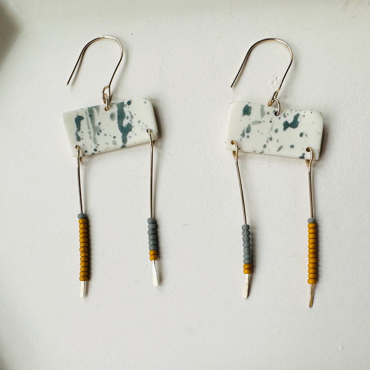 Beaded balance dangle earring