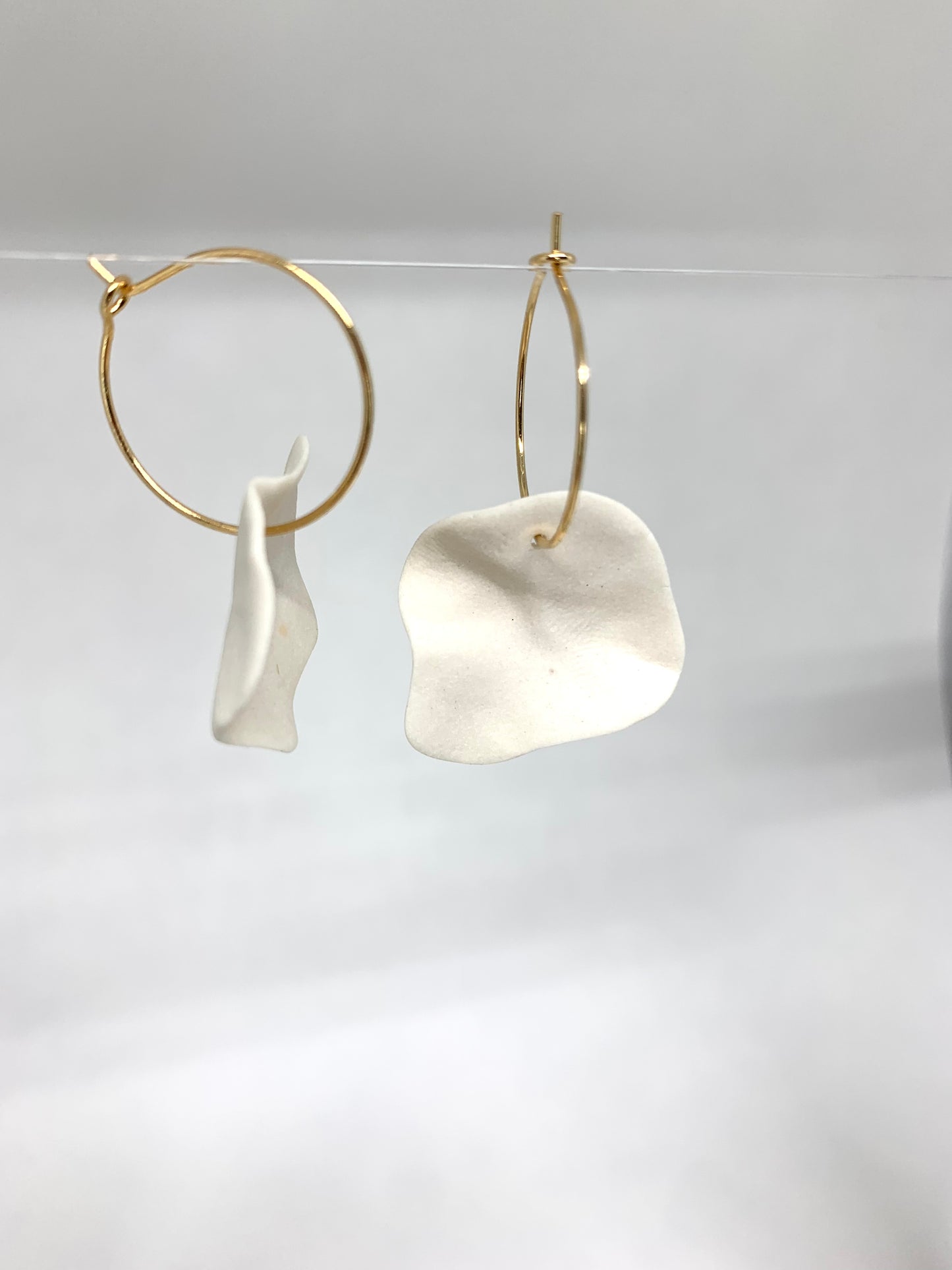 Full petal hoop earring