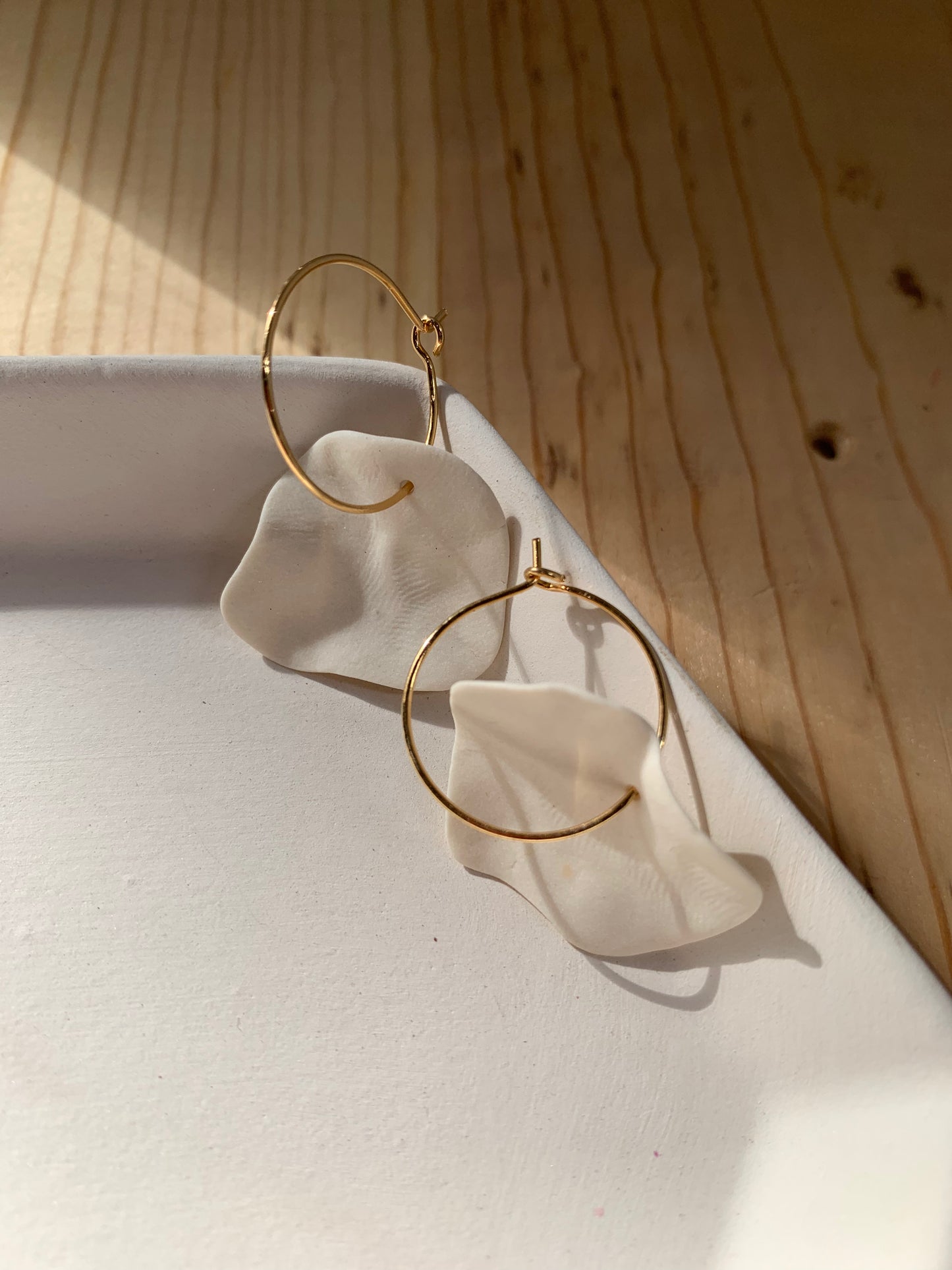 Full petal hoop earring