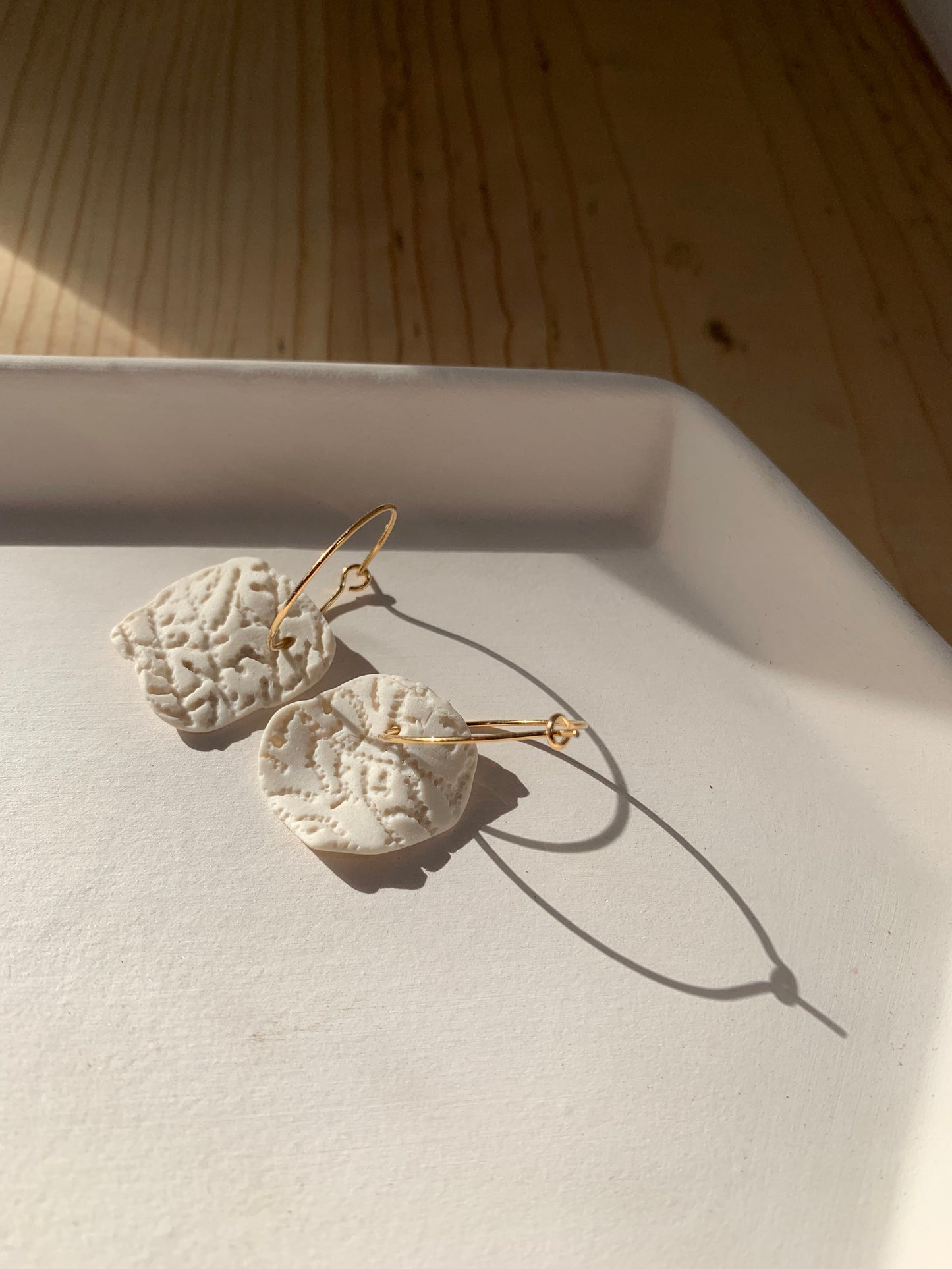 Coral petal hoop earring
