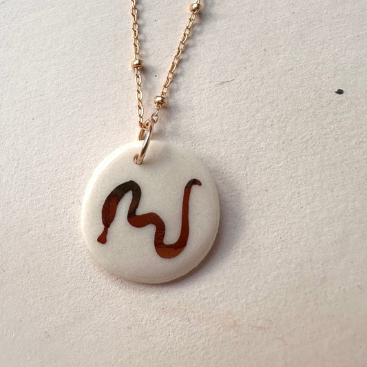 Snake dreams necklace