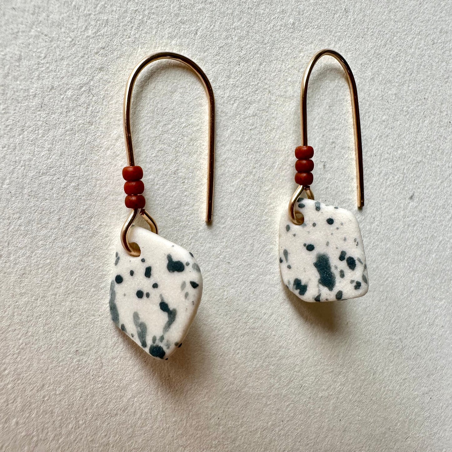 Beaded  flicker dangle earring- steel blue and rust