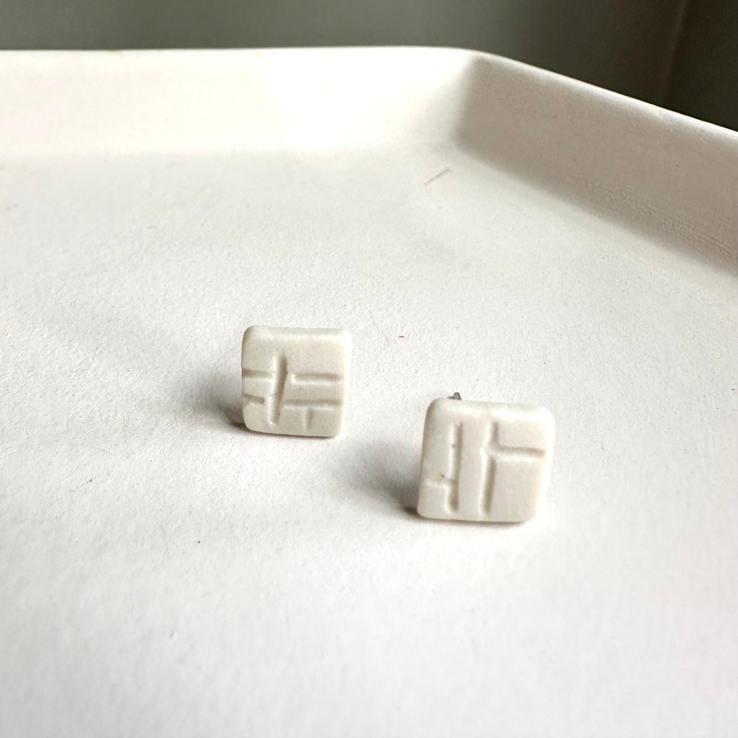 square stud earring- crossfire