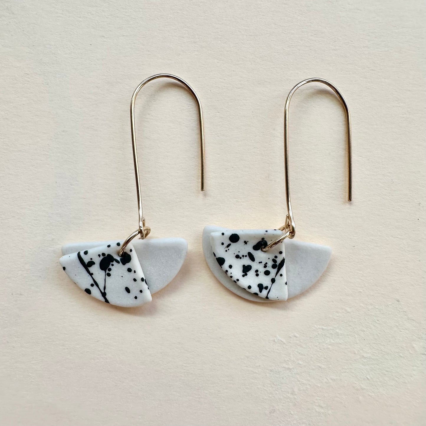 layered splatter + bare dangle earring