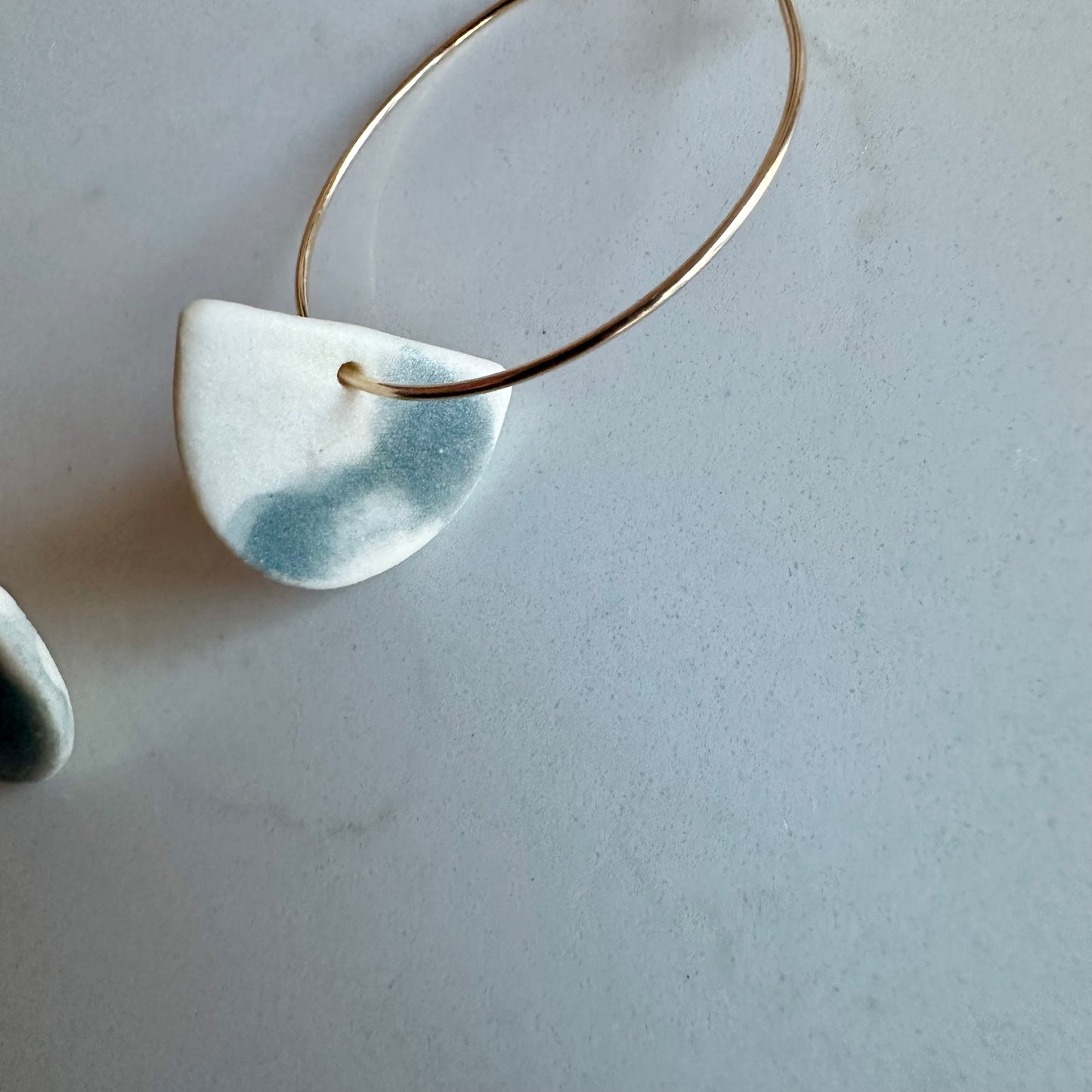 hazy steel droplet half-moon hoop earring