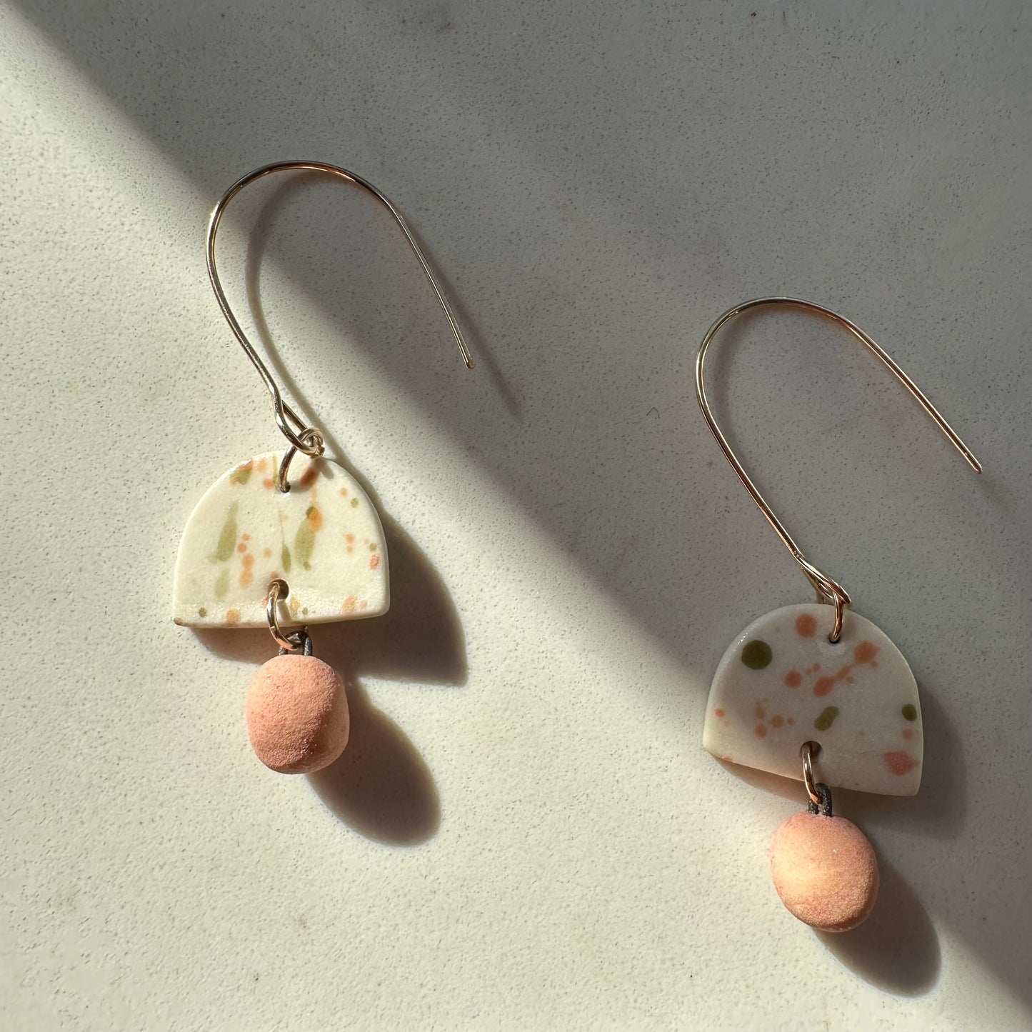 splattered dome with ball dangle earring