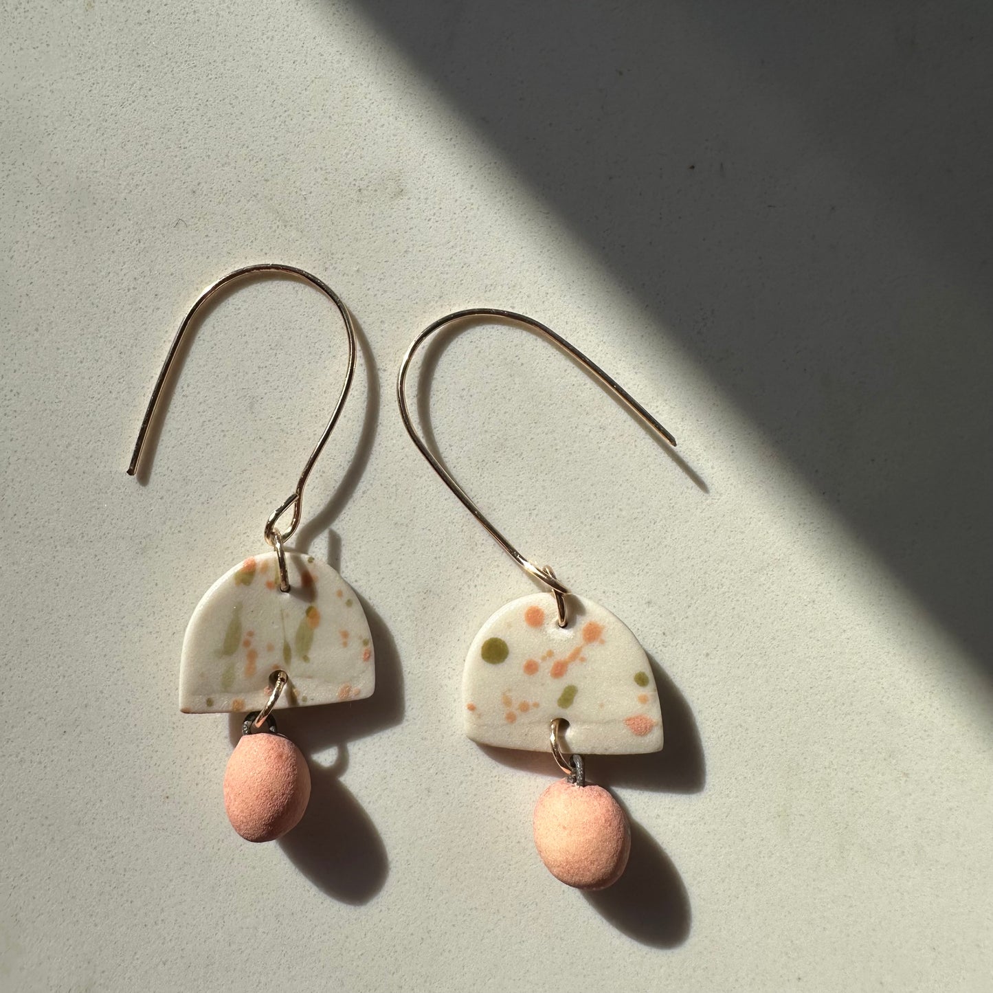 splattered dome with ball dangle earring