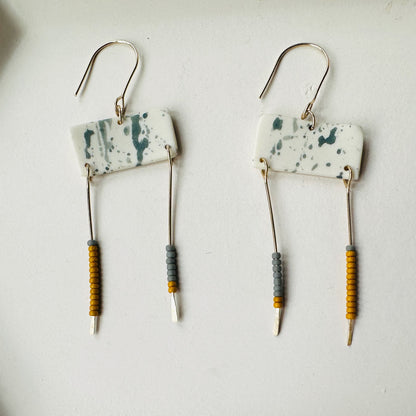Beaded balance dangle earring
