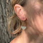 Half-moon hoop earring