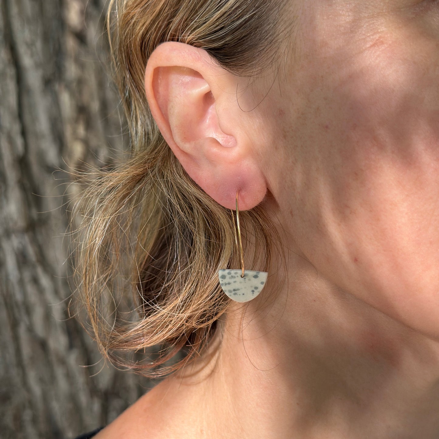 Half-moon hoop earring