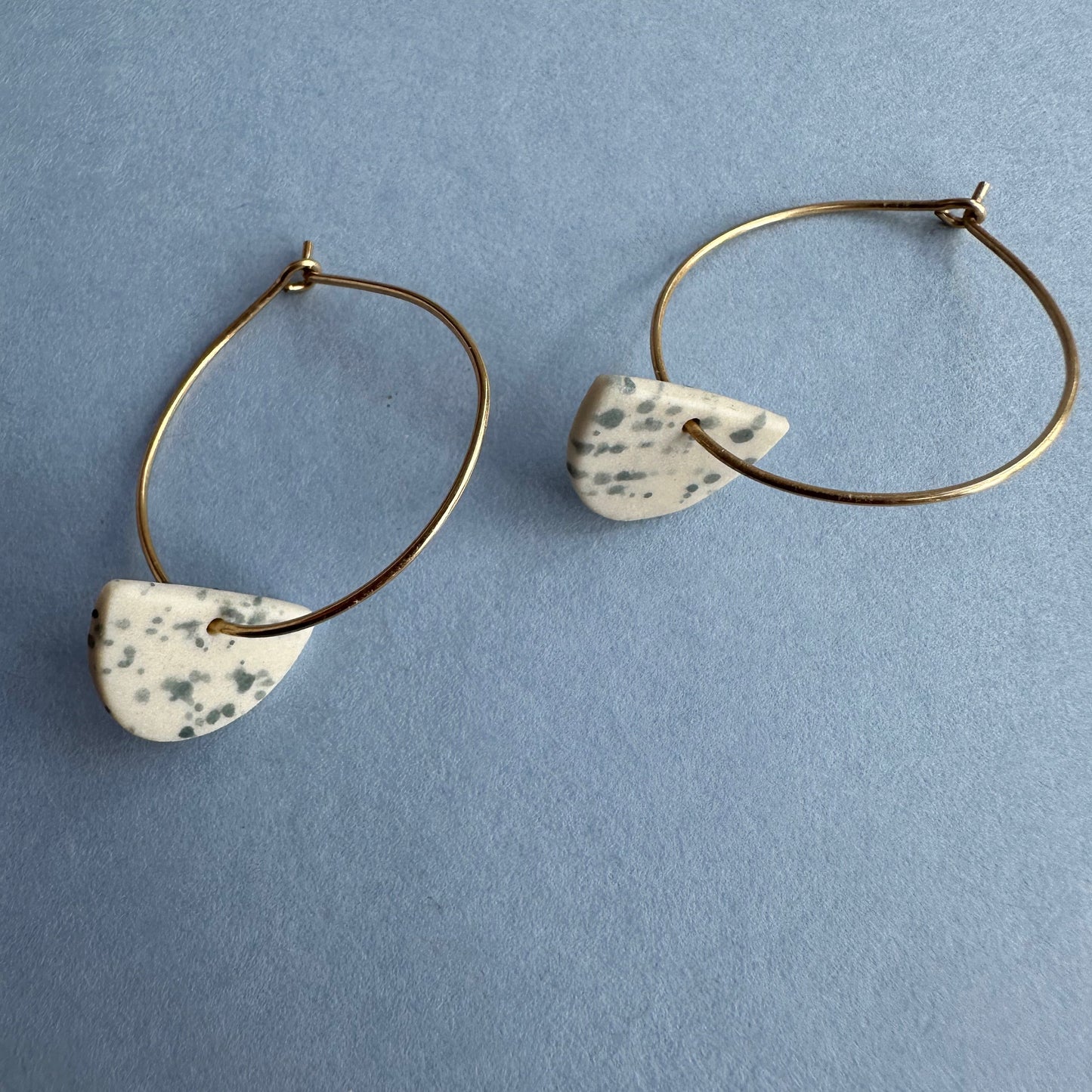 Half-moon hoop earring