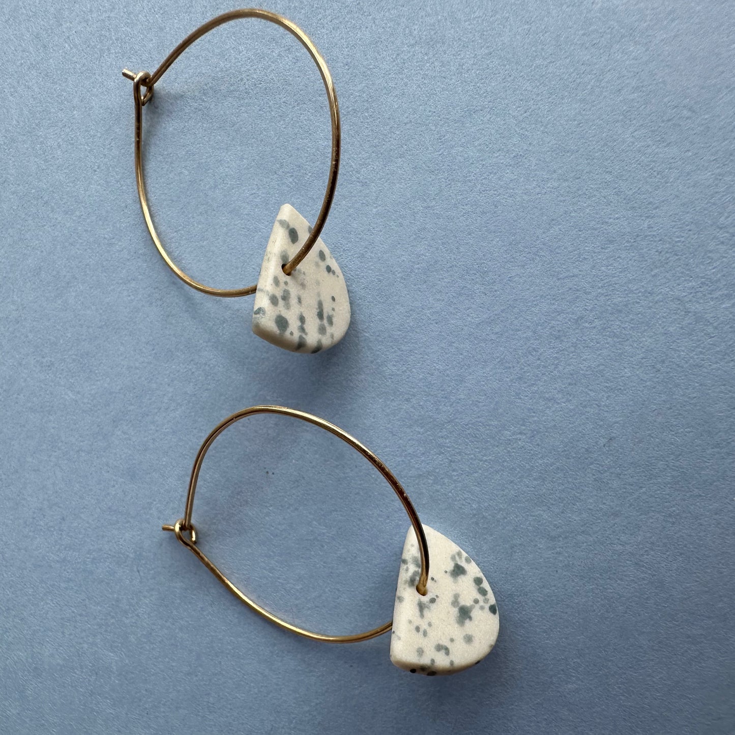 Half-moon hoop earring