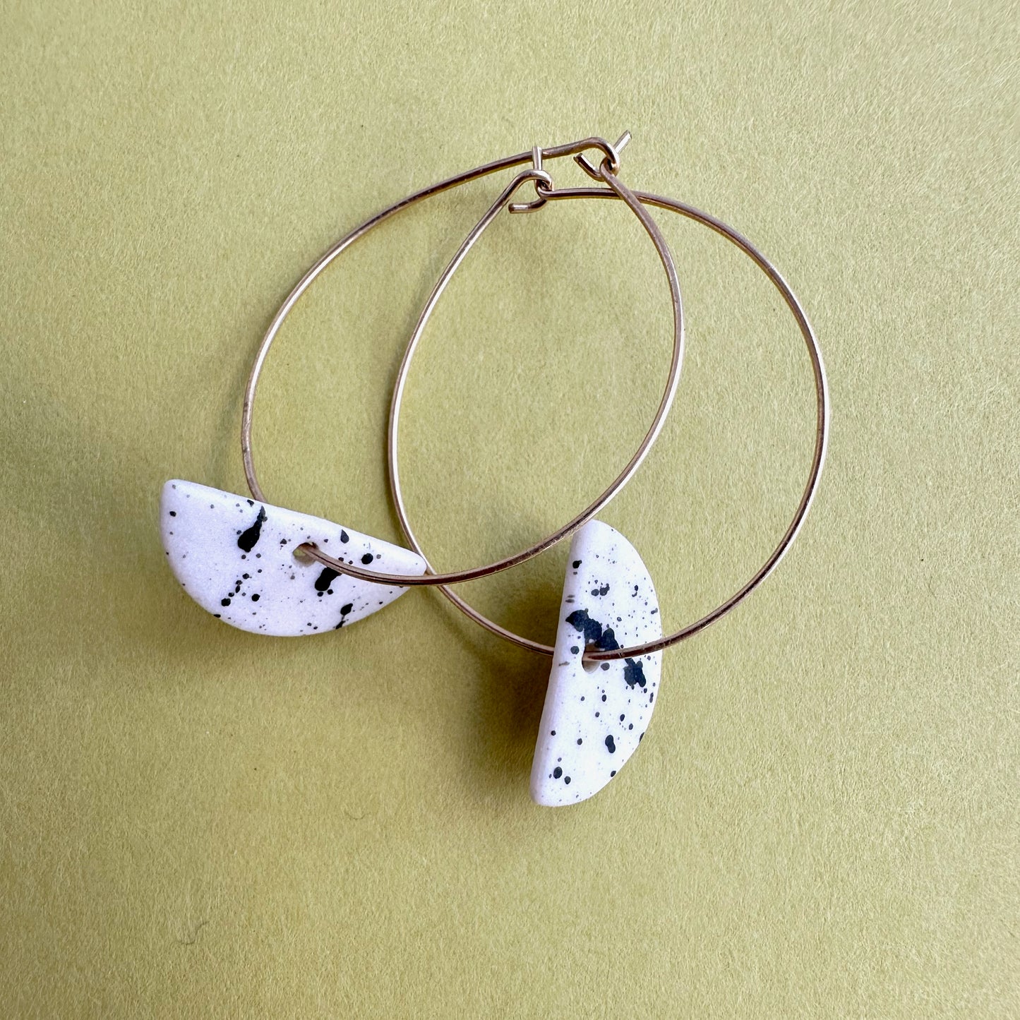 Half-moon hoop earring