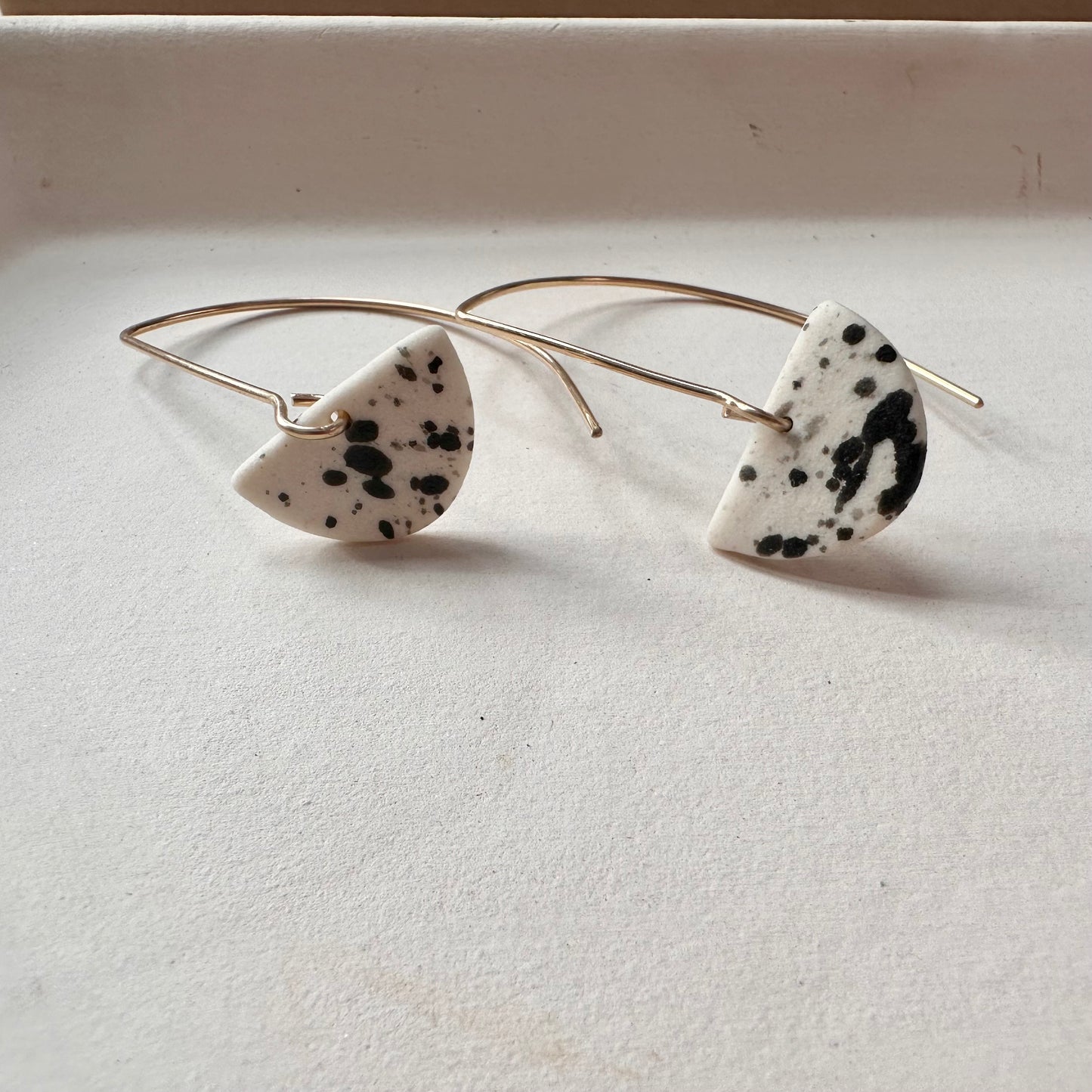 Half-moon dangle flicker earring