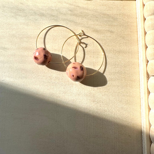 rose colored balls hoop earring