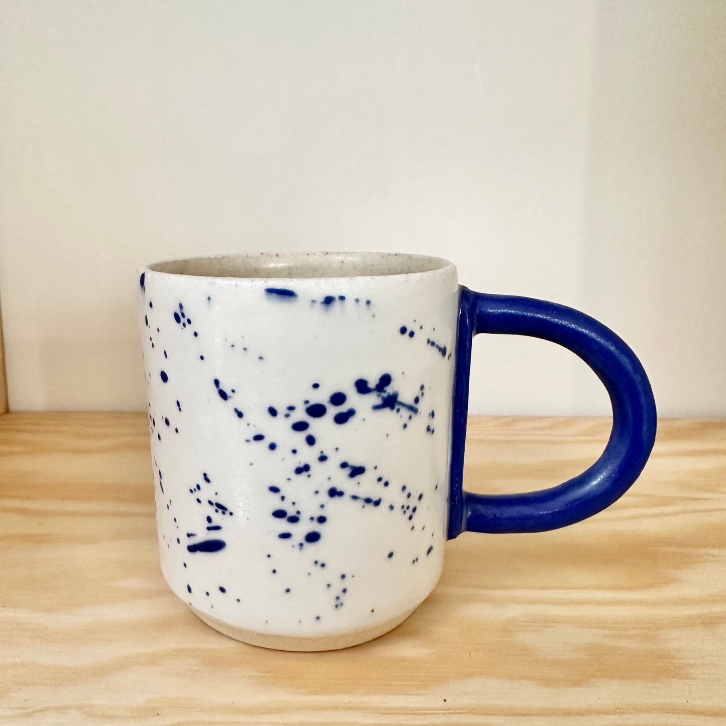 mug with blue splatter