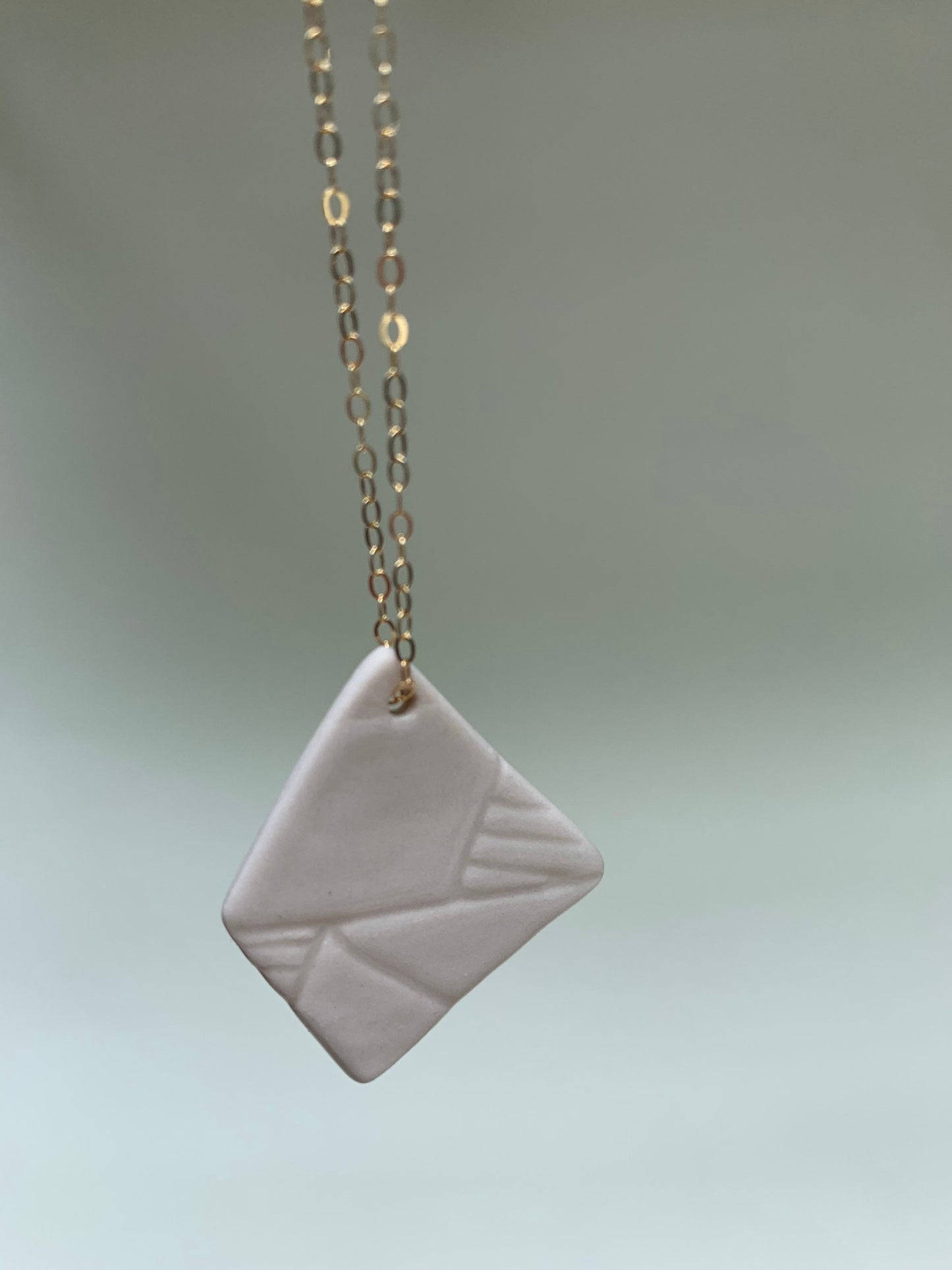 small geo pendant necklace